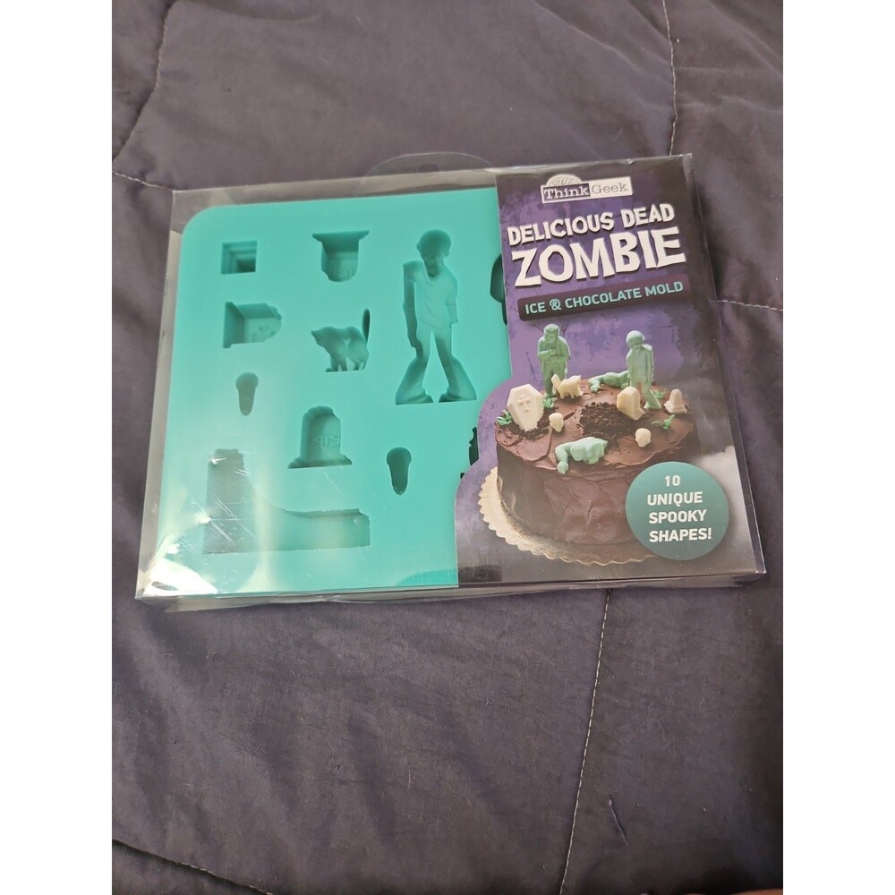 Brand New 2014 Think Geek Delicious Dead Zombie Ice Cube Candy Mold